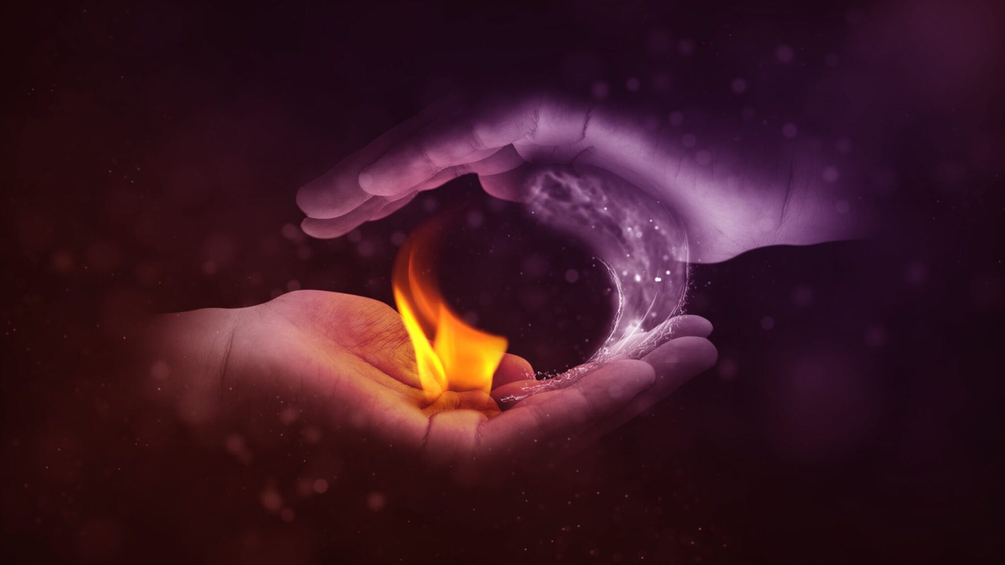 human hands cupped around a fire flame sitting in the palm of the hand next to a column of ice referencing attitude polarization